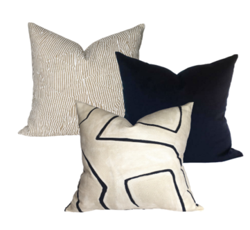 A set of 3 pillows kelly wearstler Avant pillow Graffito pillow and a black velvet pillow all on a white background
