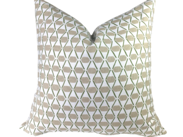 1 thibaut Denver pillow with beige rectangles and green diamond design on white. Pillow is on a white pillow
