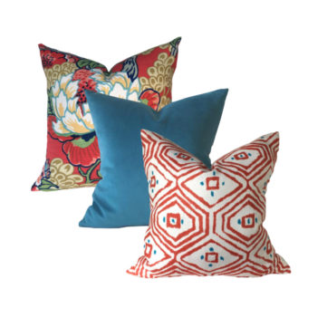 three pillows Thibaut Honshu, Teal Velvet and Thibaut Pass a Grille pillow in combination on a white background